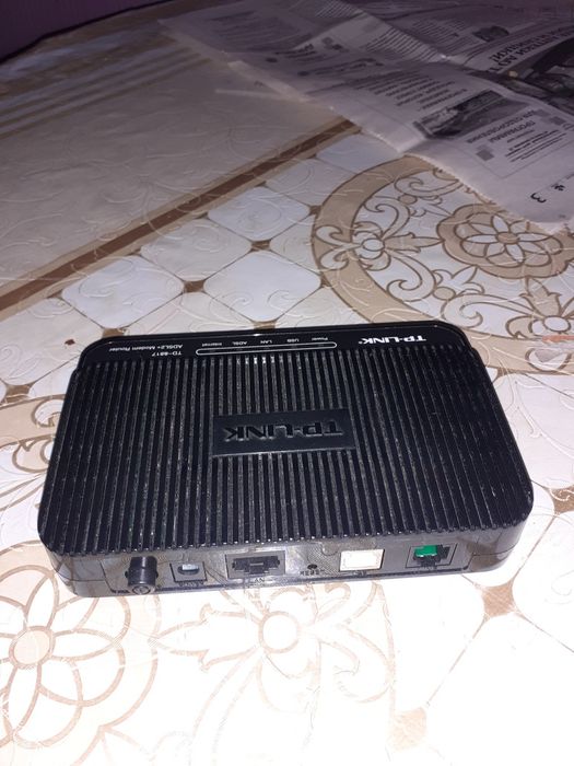 TP-LINK  Модем  TD-8817
