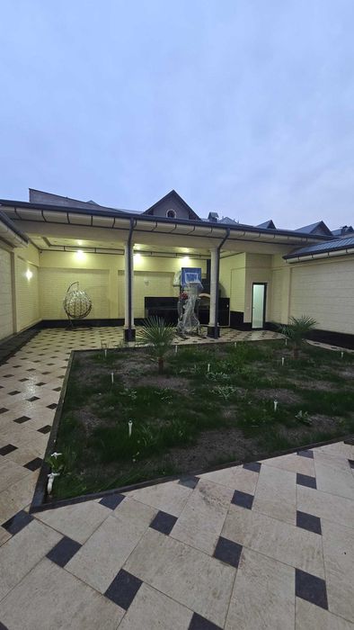 Келес мост участок  2,5 сотки Фасад 10 на 25 метров ор-р BYD автосалон