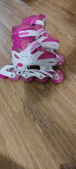 Роликовые коньки  раздвижные