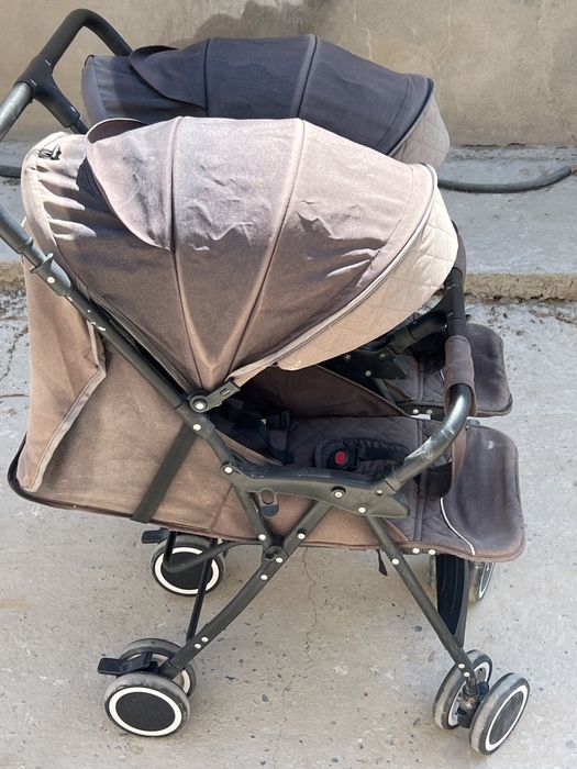 Коляска для двойни