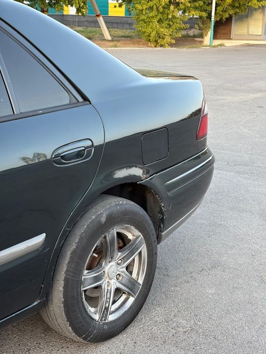 Мазда 626 птичка