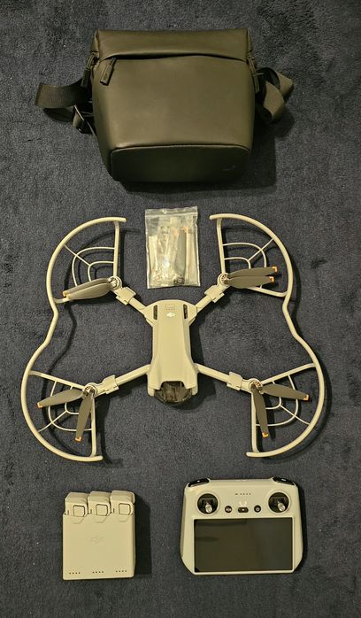 Drona DJI MINI 3 Fly more combo+protectie elicii, limita inaltime 500m