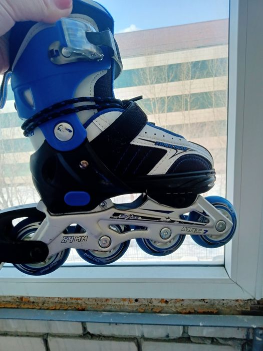 Роликовые коньки