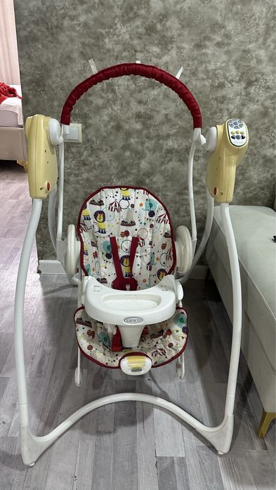 Детская электронная качеля Crago