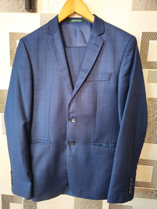 Продам костюм пиджак брюки 48 размер
