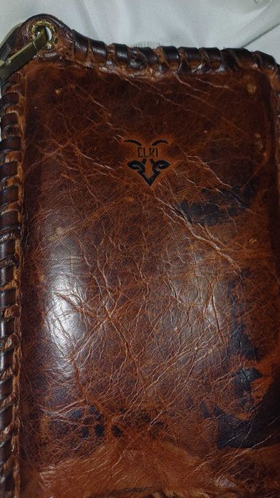 Манерка с кожен калъф