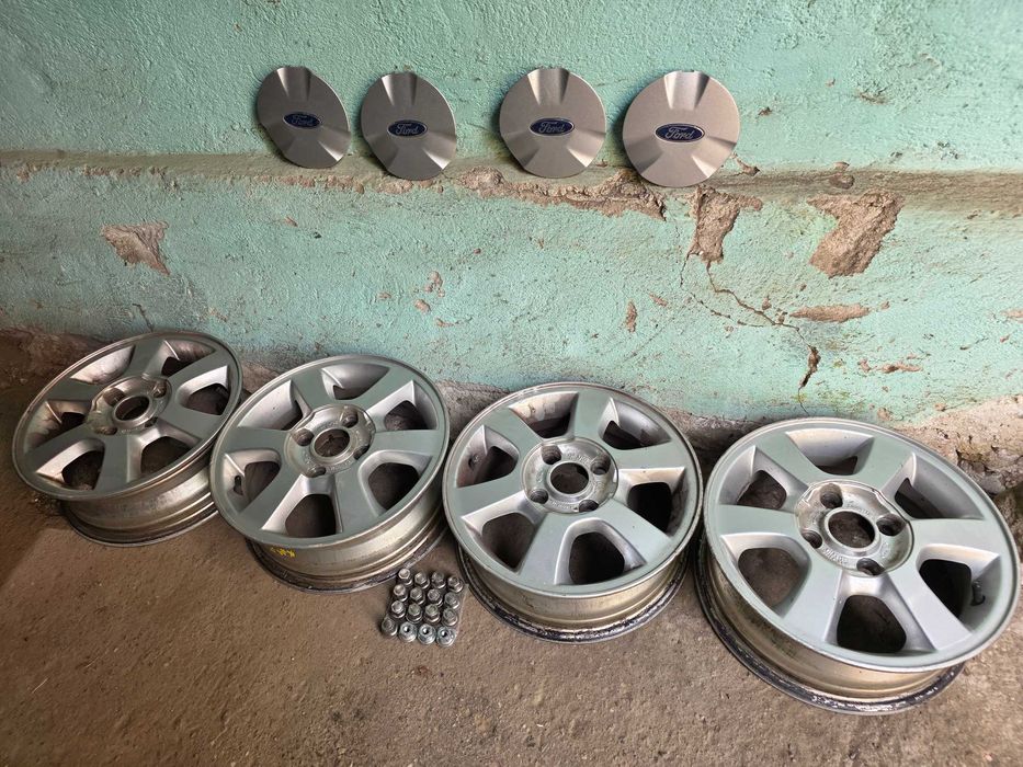 Set 4 jante aliaj 14'' Ford 5Jx14 H2 ET36 + 4 capace + 16 piulite