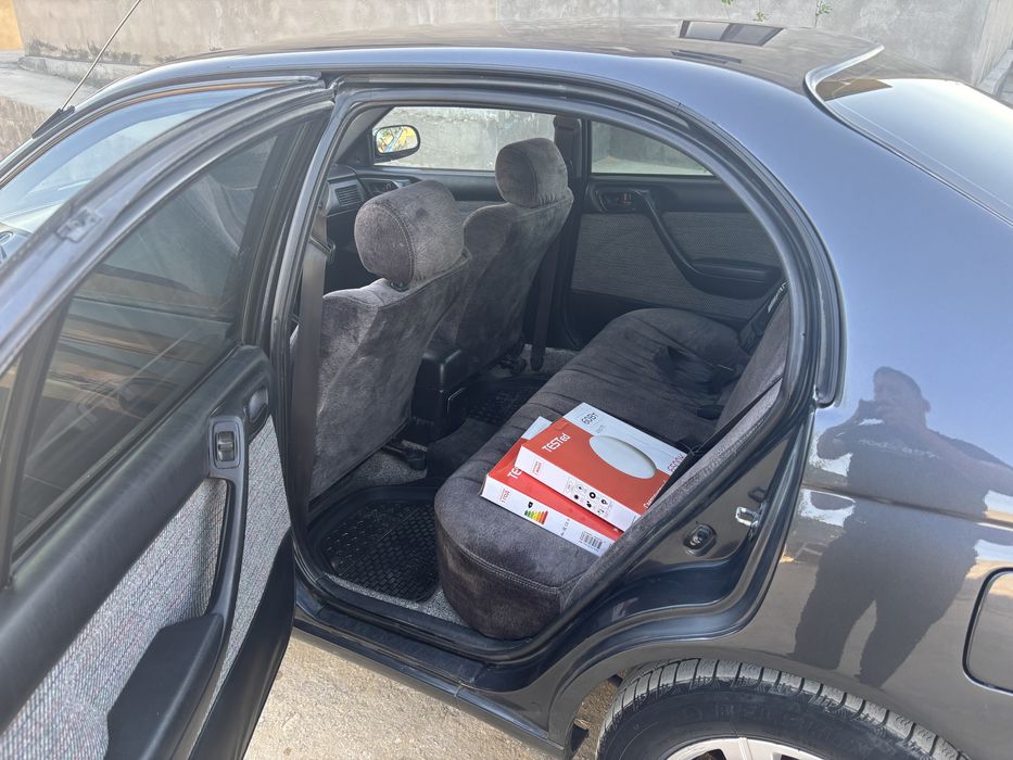 Тойота карина Е