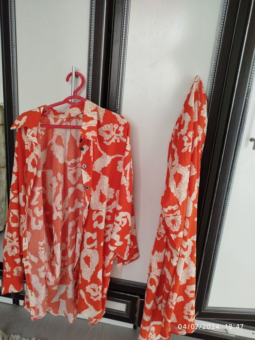 Olov rang kiyim kafolati bilan yangi yaqi ga oligan