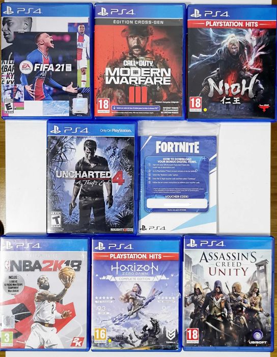 PS4 cu 2 manete + 8 jocuri bune