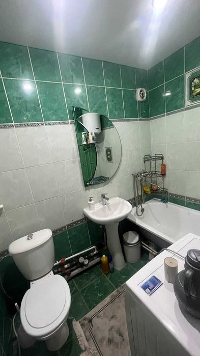 Продается 4 комнатная в центре