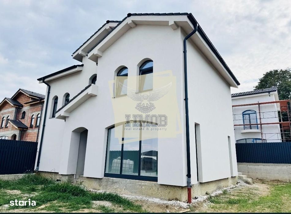 Casa individuala 120 mp utili cu 4 camere 2 bai mp si teren 264 mp
