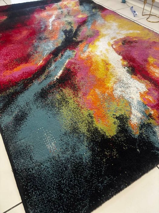 Килим за холна стая