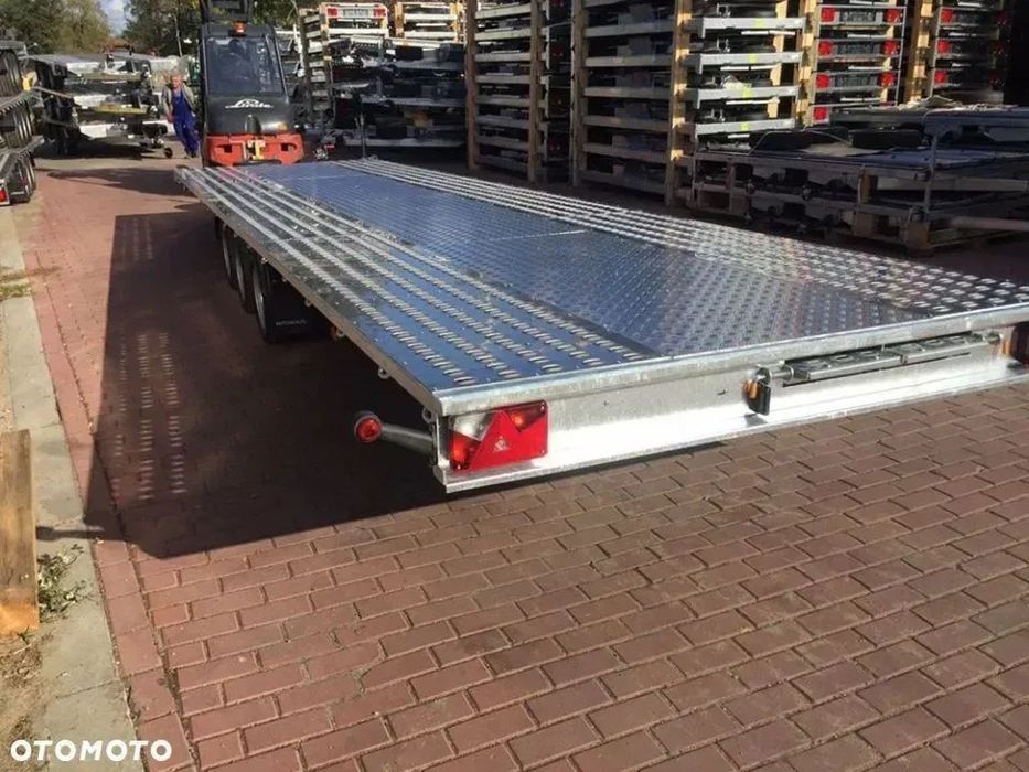Niewiadow Remorca/Platforma Transport auto 3 axe 8.5m 3500kg Remorca 8.5m/2.1m/3 axe/3500kg/troliu/podea cu tabla de aluminiu
