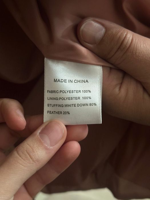 Пуховки безрукоавка