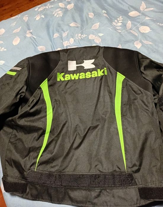 Продам мото куртка новый