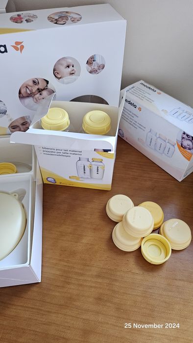 Pompă electrică Medela + biberoane