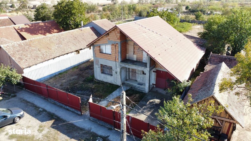 Casa individuala la rosu, intabulata - Uliuc - Sacosu Turcesc