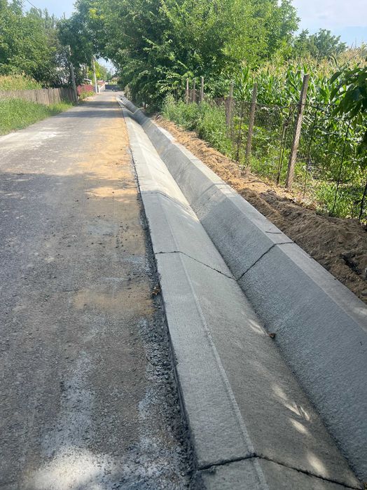 Santuri si rigole betonate  rigole de acostament realizate mecanizat