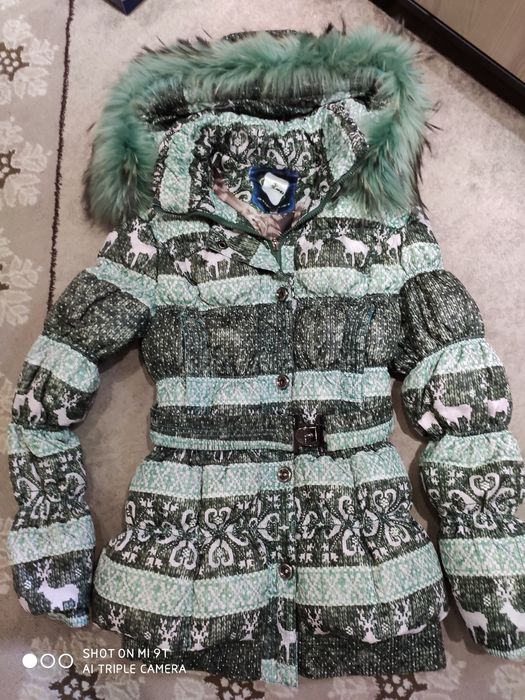 Продам пуховик женский