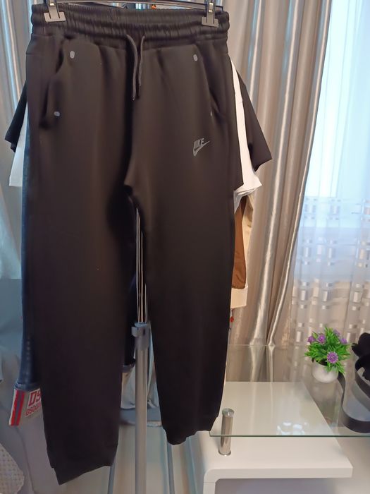Pantaloni Nike tech pentru bărbați