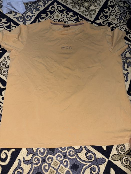 Футболка от  GLOBAL NOMADS