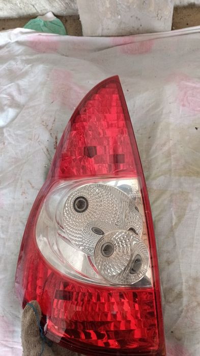 Задний левая фар приора