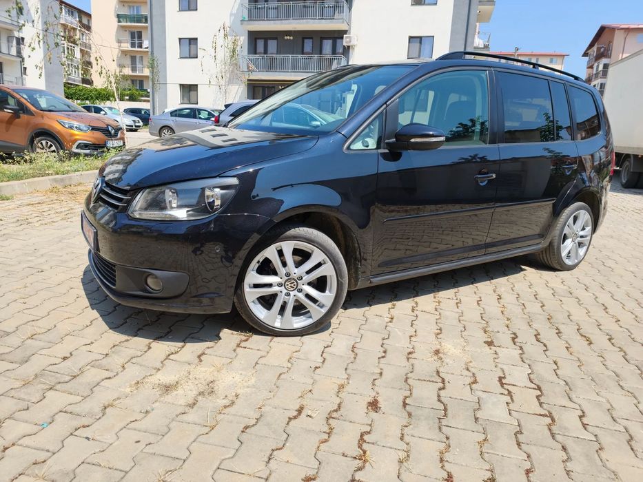 Volkswagen Touran 7 locuri,impecabila estetic si tehnic