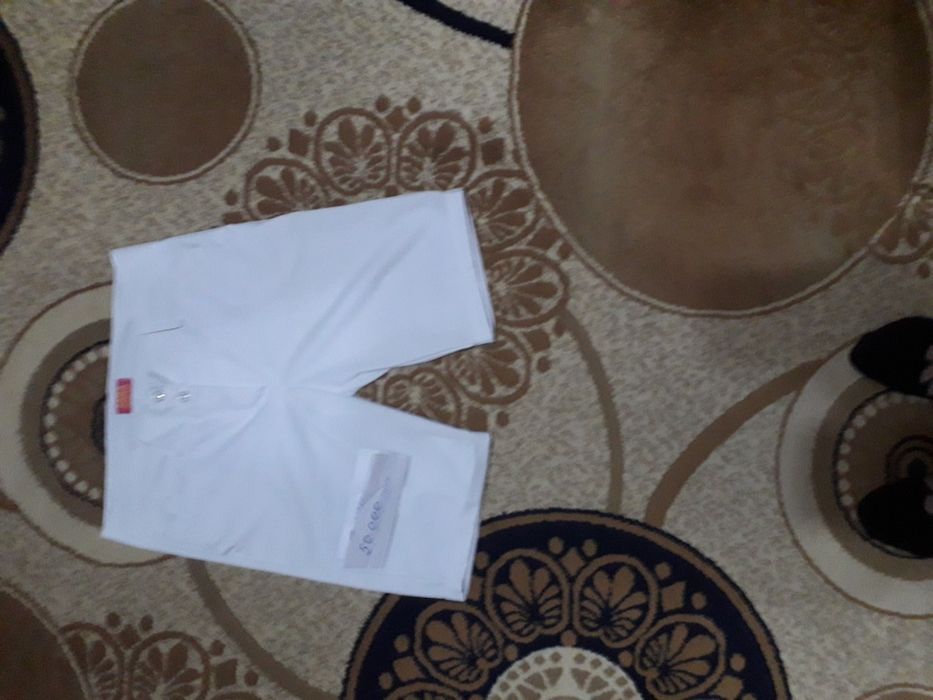 Брюки  зеленые в отличном состоянии 46 размер