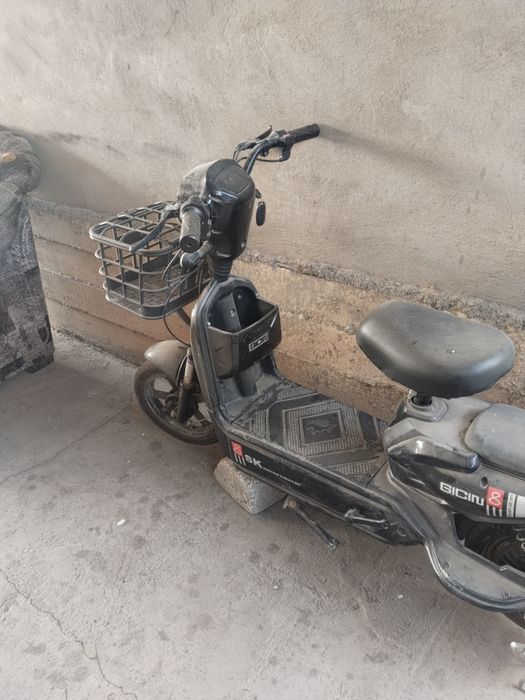 Электроскутер велосипеды