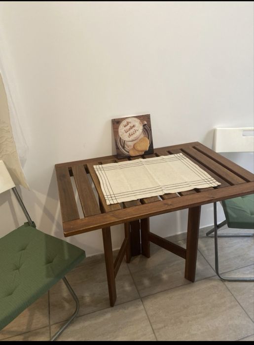 Inchiriez garsoniera 70 mp,,cu curte
