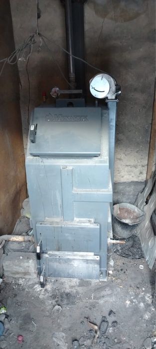 Продам котел 100кв с дымоходом