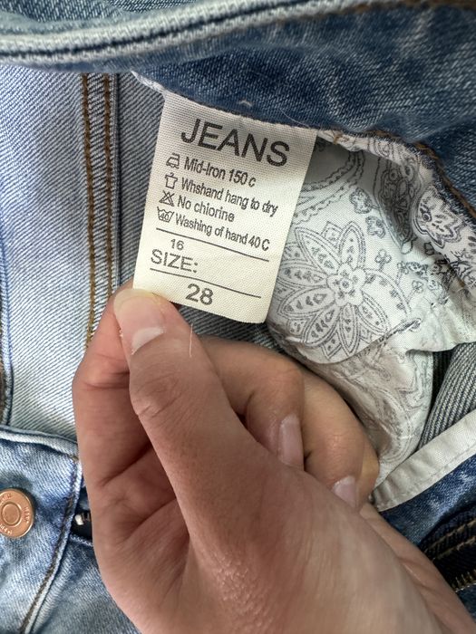 Джинсы трубы голубые