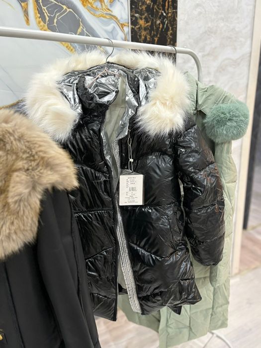 Продам новые пуховики