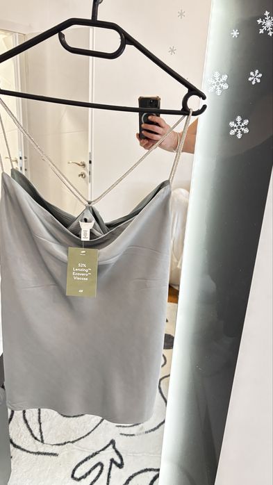 Светло син потник с блестящи презрамки