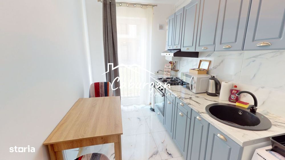 Apartament cu 2 camere, 50mp utili+balcon, bucatarie inchisa,parcare.