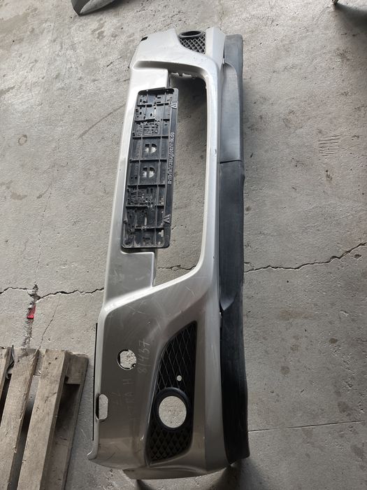 Бампер передний Опель Астра Н