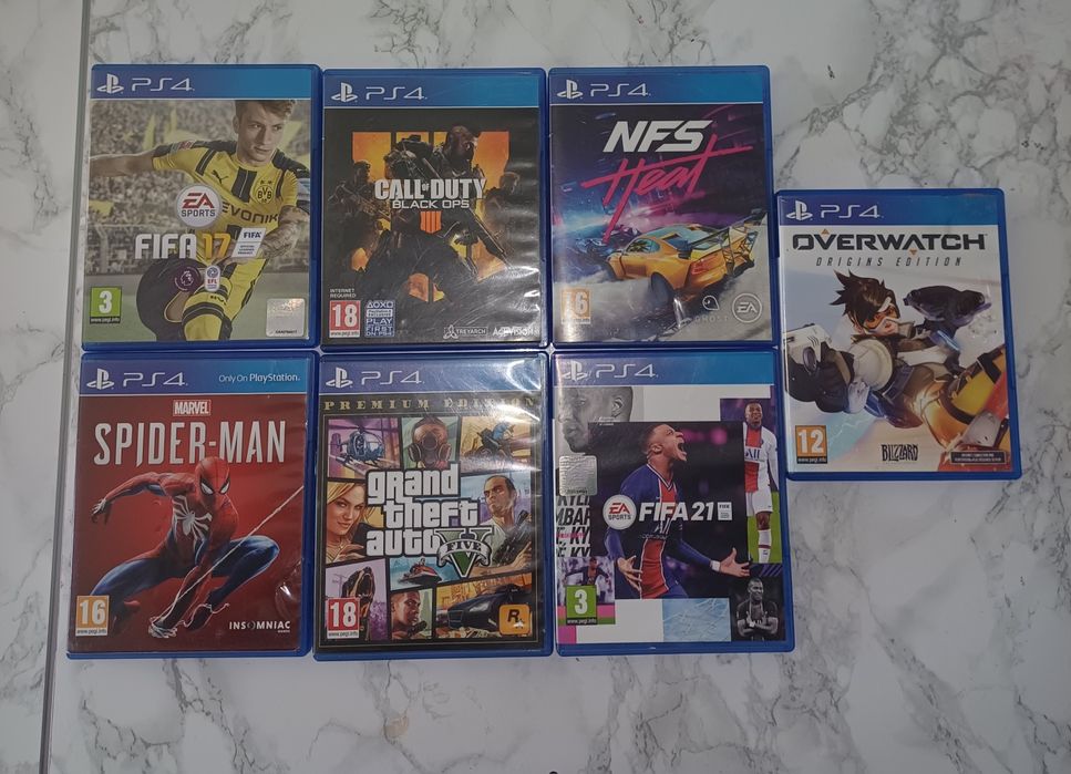 Vand PS4 Slim 500GB cu 1 maneta +7 jocuri pe disc