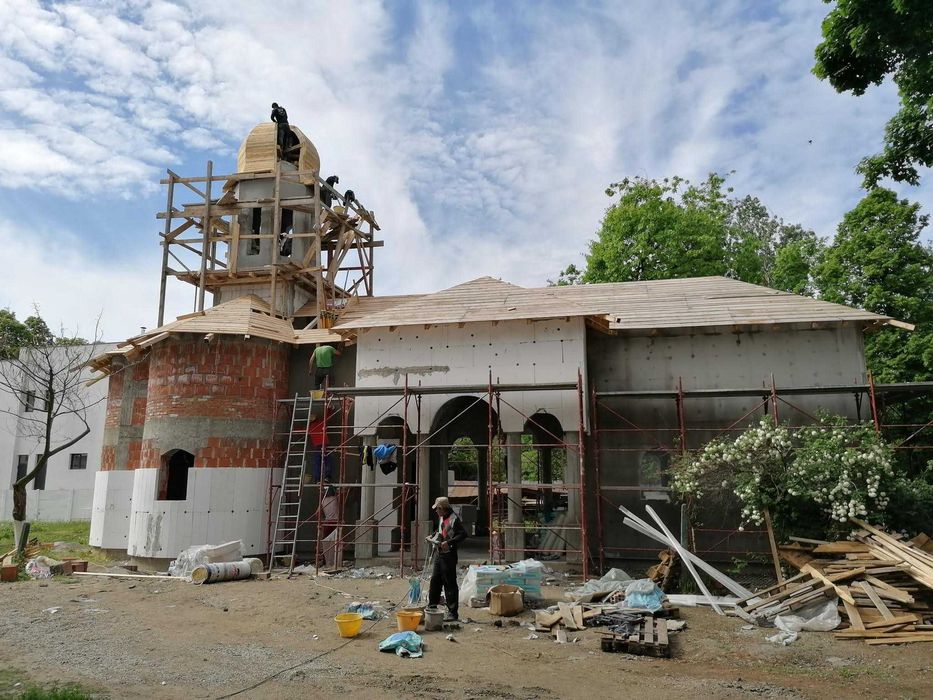 Echipă construcții sau firma