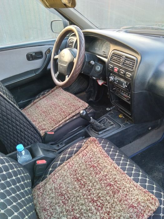 Автомобиль Ниссан примера п10