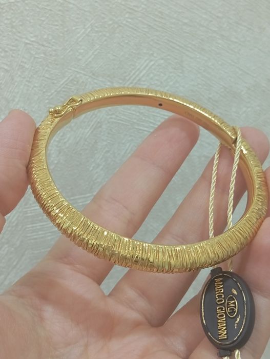 Золотой браслет от Марко Жаванни