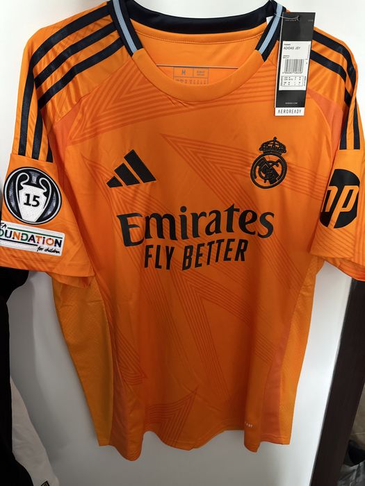 Tricou Mbappe Real Madrid third kit portocaliu fotbal badge uri ucl