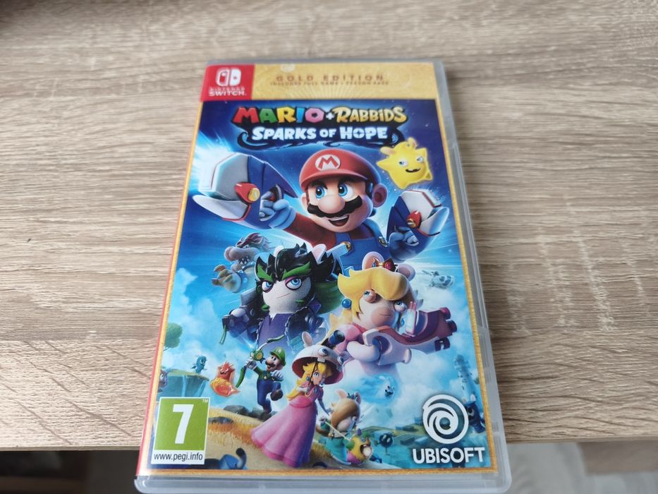 Продавам Nintendo Switch OLED в перфектно състояние с подарък калъф, стойка и игра