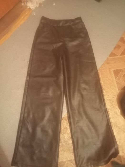 Кожаные брюки 42.44