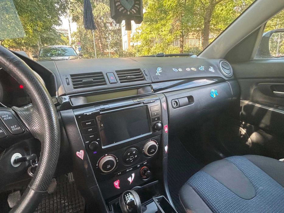 Автомобил Мазда 3