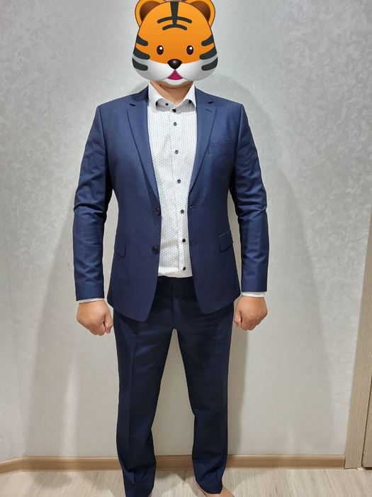 Продам костюм новый