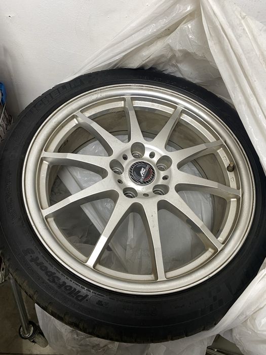 диски Oz с шинами R 18