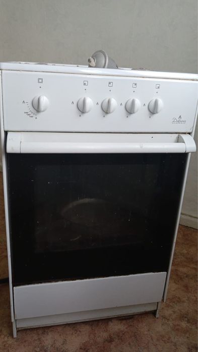 Продается газовую плиту б/у : 3 газовые конфорки+1 электрическа.