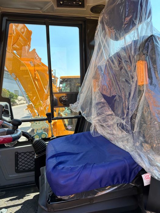 Фронтальные погрузчик MAXBULL модель SW948  - 1,7 куба