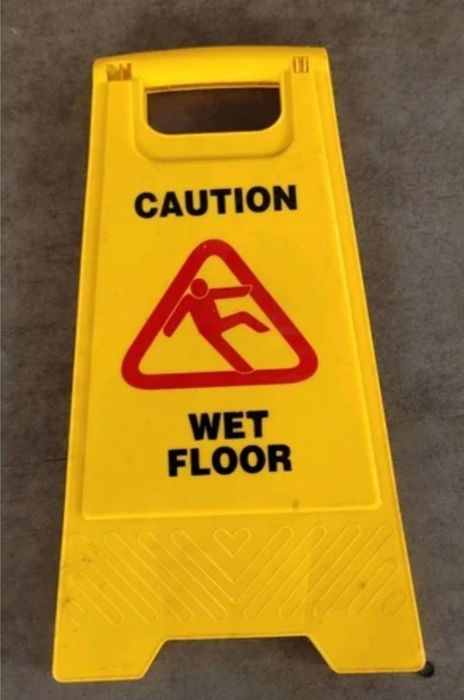 Складной знак WET FLOOR CAUTION — доставка бесплатная